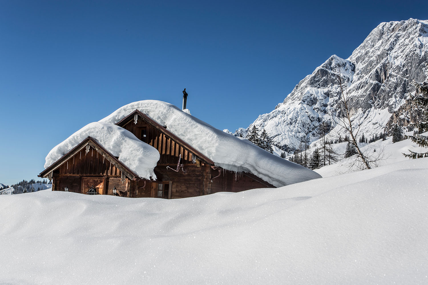 Mountain hut in the snow
